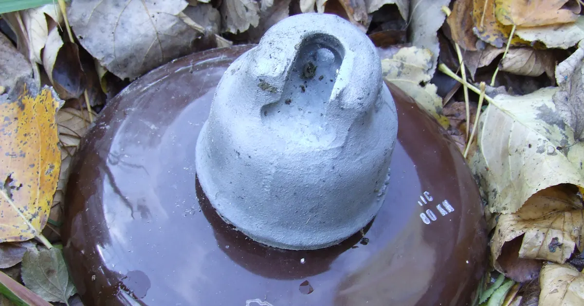 Glazed ceramic electrical insulator with a brown glaze, an example of technical ceramic glazing